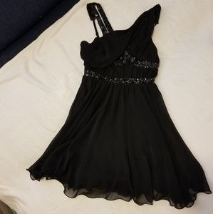 Black sequin keyhole flounce dress